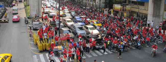 Defiant redshirts gear up for military onslaught on their Bangkok camp